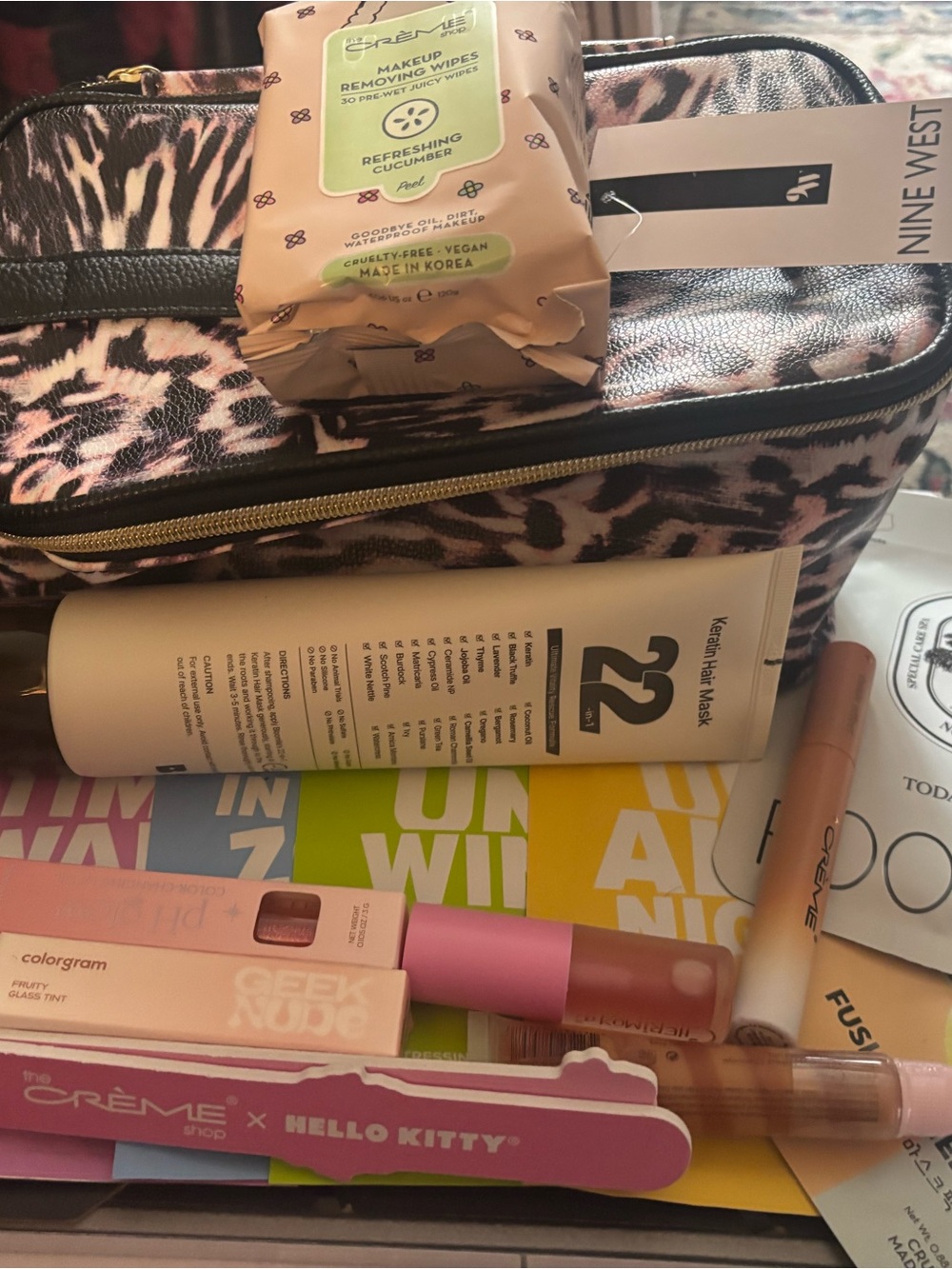 Nine West Pink and Black Leopard Print Makeup Bag with Assorted Lipsticks